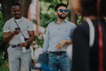 Casual business meeting outdoors with relaxed people