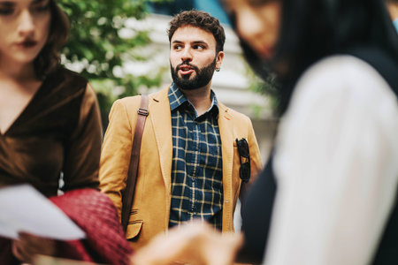 Young people having a discussion in an urban outdoor settingの写真素材