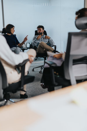 Group of coworkers engage in a brainstorming session, exchanging ideas and strategies.の写真素材