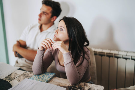 High school students engaged in after-school project with professorの写真素材
