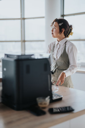 Business worker making coffee in a modern office setting