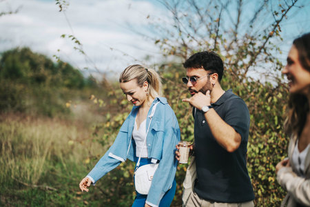 Friends enjoying a relaxing nature walk on a sunny day