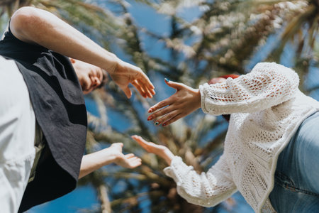 Two friends sharing a moment under the tropical sun on vacationの写真素材