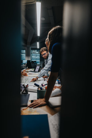 Multicultural team brainstorming in a modern office environmentの写真素材