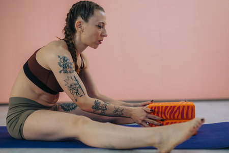Woman Practicing Yoga with Blocks in a Tranquil Indoor Setting