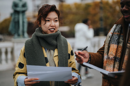 Woman outdoors talking with another person during a casual interaction in autumn