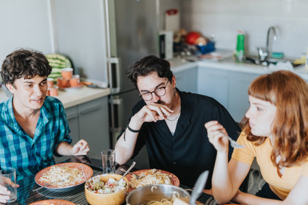 Casual friends sharing a meal at home