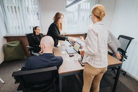 Business colleagues engaging in a collaborative and dynamic group meeting