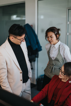Business employees collaborating in modern office setting
