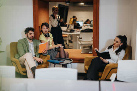 Casual team discussion in a modern office collaborative workspace