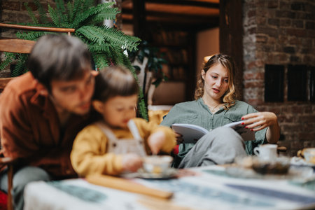 Family enjoying quality time together in a cozy home settingの写真素材