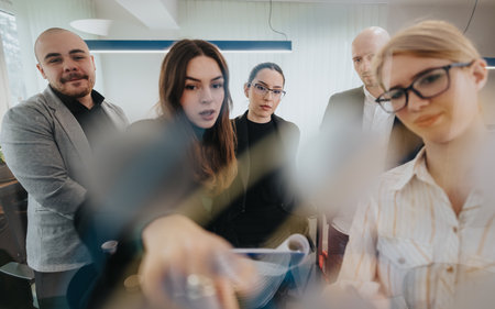 Business team collaborating on a planning session with teamwork and innovationの写真素材