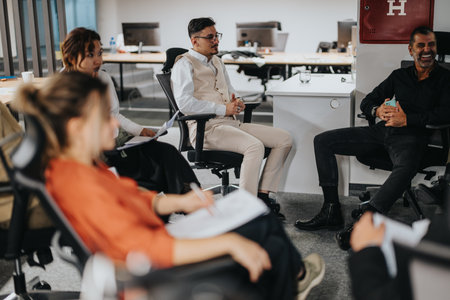 Colleagues engaging in a productive business meeting in a modern office settingの写真素材