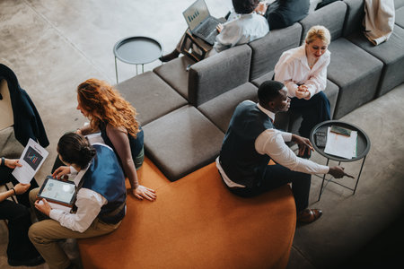 Group of people collaborating in a modern co working space
