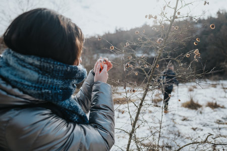 Young people hiking through a serene winter landscape capturing natures beauty