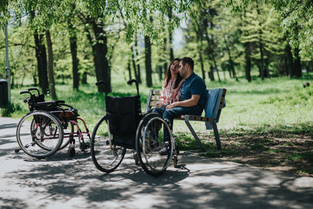Couple Enjoying a Peaceful Moment Together on a Park Bench Surrounded by Natureの写真素材