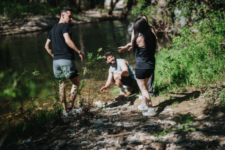 Friends enjoying outdoor activities by a serene river on a sunny day
