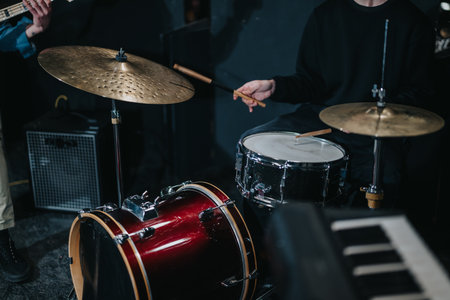 Musician Playing a Drum Set with Cymbals in a Stage Performance