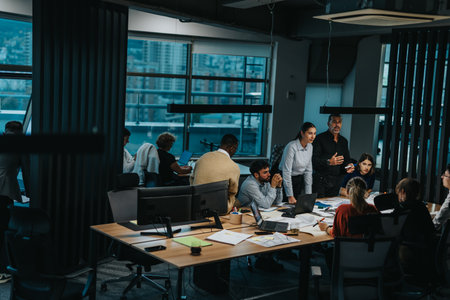 Diverse and dynamic team collaborating in modern office setting