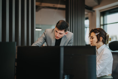 Diverse colleagues brainstorming and strategizing in modern officeの写真素材