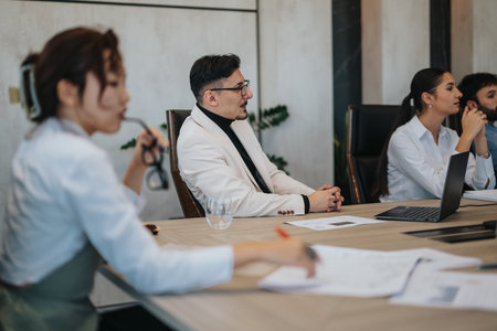 Multiracial business team in a modern meeting room
