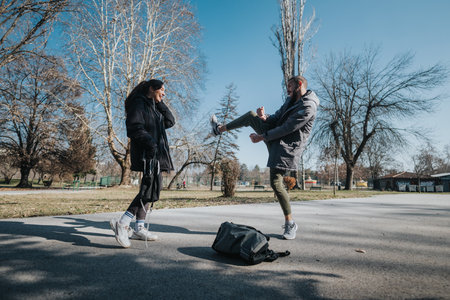 Teenagers Having Fun Outdoors Engaging in Playful Interaction in a Park