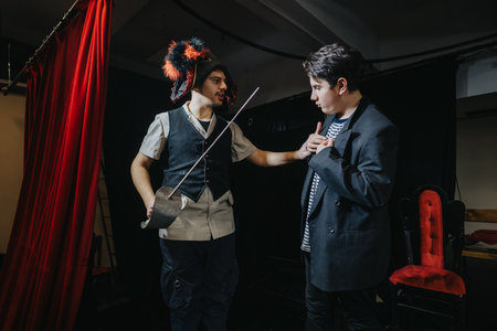Young performers dressed in character engage in theatrical practice