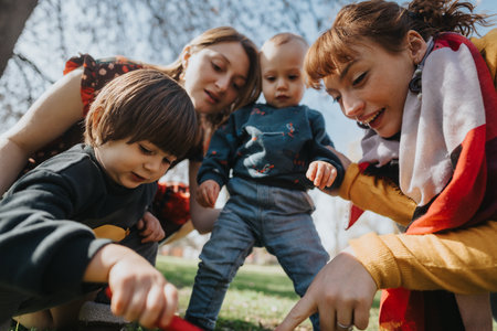 A heartfelt moment with mothers and children enjoying outdoor playtime
