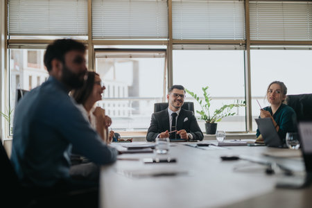 Multicultural group of business people collaborating in a modern office