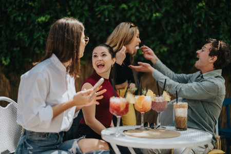Group of friends enjoying refreshing drinks together outdoors in a relaxed atmosphere