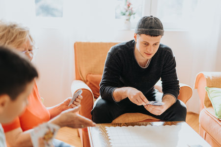Family gathering focused on playing a card game together