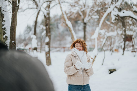 Friends enjoying a playful snow day in a beautiful forest setting