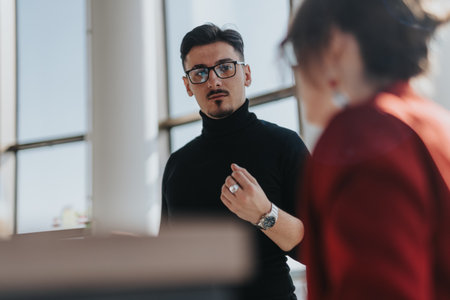 Casual business discussion in modern office kitchen setting