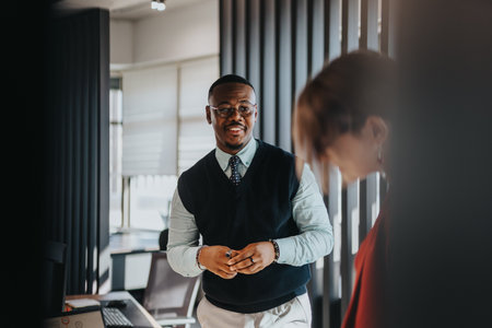 Multicultural business team collaborating on a project in modern officeの写真素材