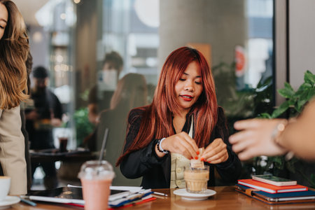 Business meeting in a modern cafe with professionals collaborationの写真素材