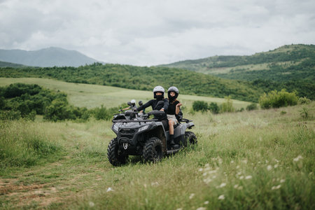 Two riders enjoying an ATV adventure in scenic nature landscape