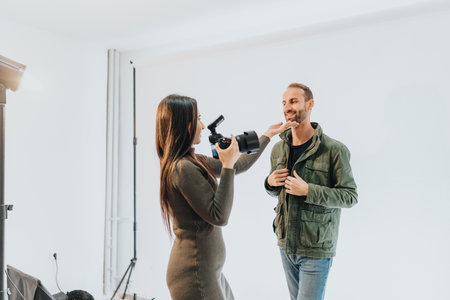 Photographer capturing a man with a playful and artistic settingの写真素材
