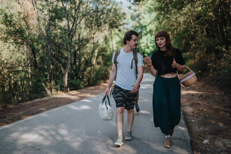 Friends walk in nature with baskets and backpacks, enjoying a relaxed day off outdoors