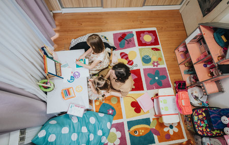Family enjoying crafts and learning time in a cozy colorful playroom