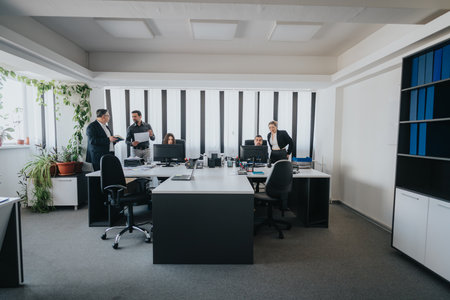 Professional business team collaborating in a modern office environment