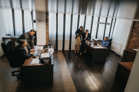Business professionals collaborating in a modern office settingの写真素材