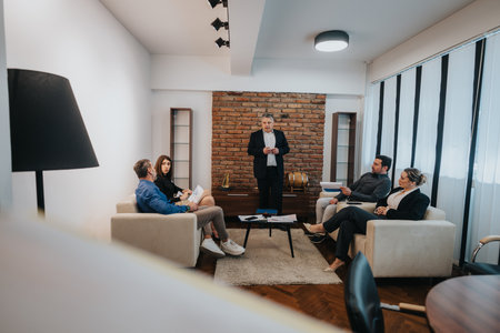 Professional business meeting in modern office interior settingの写真素材