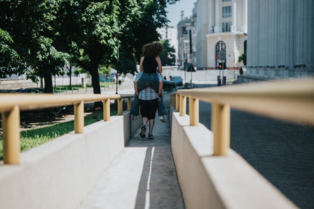 Family enjoys a playful carry on a city ramp in a bright urban street scene