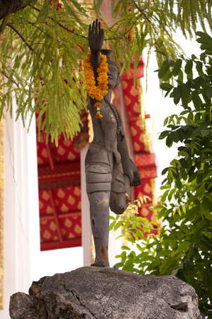 exercise by hermit posture in thai templeの写真素材
