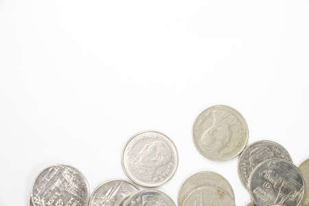 one baht coin in group on lower of frame, good for use in background or presentationの写真素材