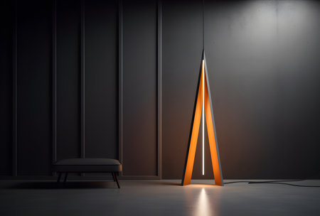 Minimalistic black room with chair and orange lampの素材