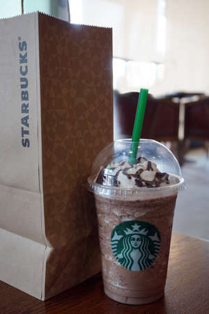 BANGKOK, THAILAND - January 26, 2016: Glass of Starbuck Coffee Chocolate. Starbucks is the world's largest coffee house with over 20,000 stores in 61 countries.のeditorial素材