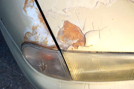 Old golden rusted carの写真素材