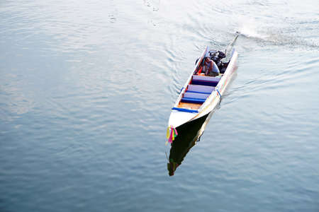 KANCHANABURI, THAILAND - APRIL 14,2016 traditional motor boat run on the river Kwai (Khwae) in Kanchanaburiのeditorial素材