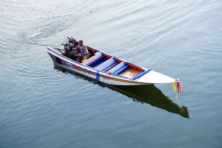 KANCHANABURI, THAILAND - APRIL 14,2016 traditional motor boat run on the river Kwai (Khwae) in Kanchanaburiのeditorial素材